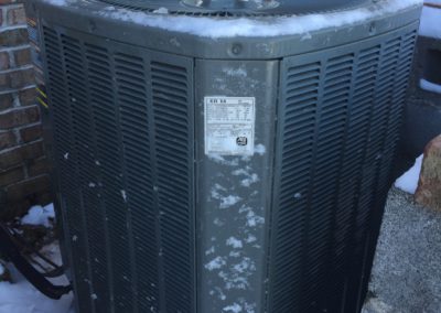 Outdoor AC unit in winter