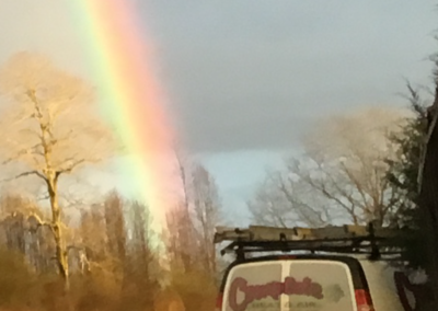 rainbow next to Complete Heat and Air van